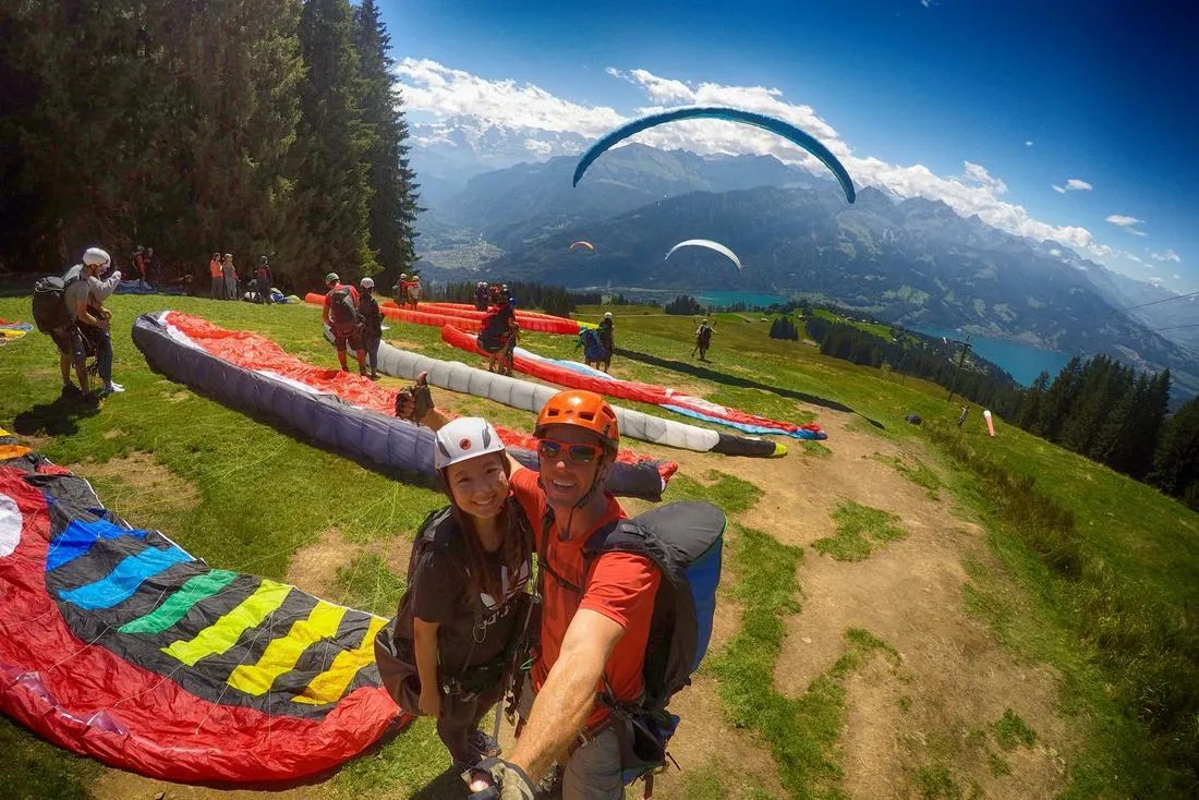 Paragliding takeoff above Interlaken in the Swiss Alps